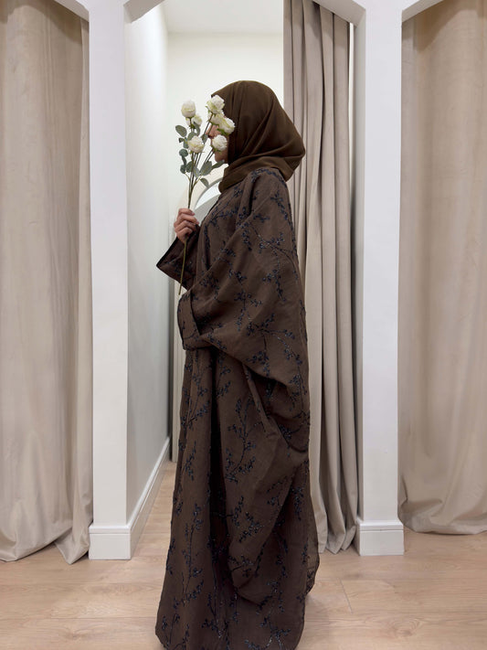 Brown embroidered abayas. Brown embroidered abaya. Brown butterfly abaya. Butterfly abaya. Linen abaya. Winter abaya. Eid abaya. Occasion abaya. Simple eid abaya. Occasion abayas. Brown eid abayas. Brown embroidered eid abayas. 