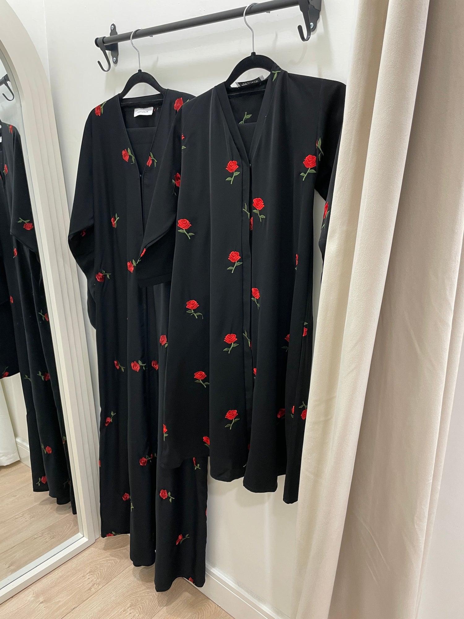 alina junior girls black rose embroidered straight abaya | hanging view